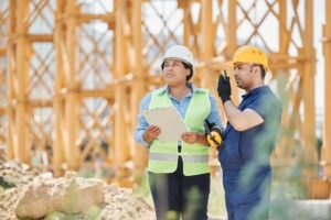 A man and woman at an oil rig
